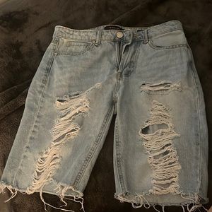 Black label medium length denim shorts
